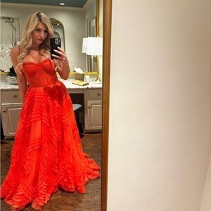 Voluminous Orange Ruffle Corset Prom Gown